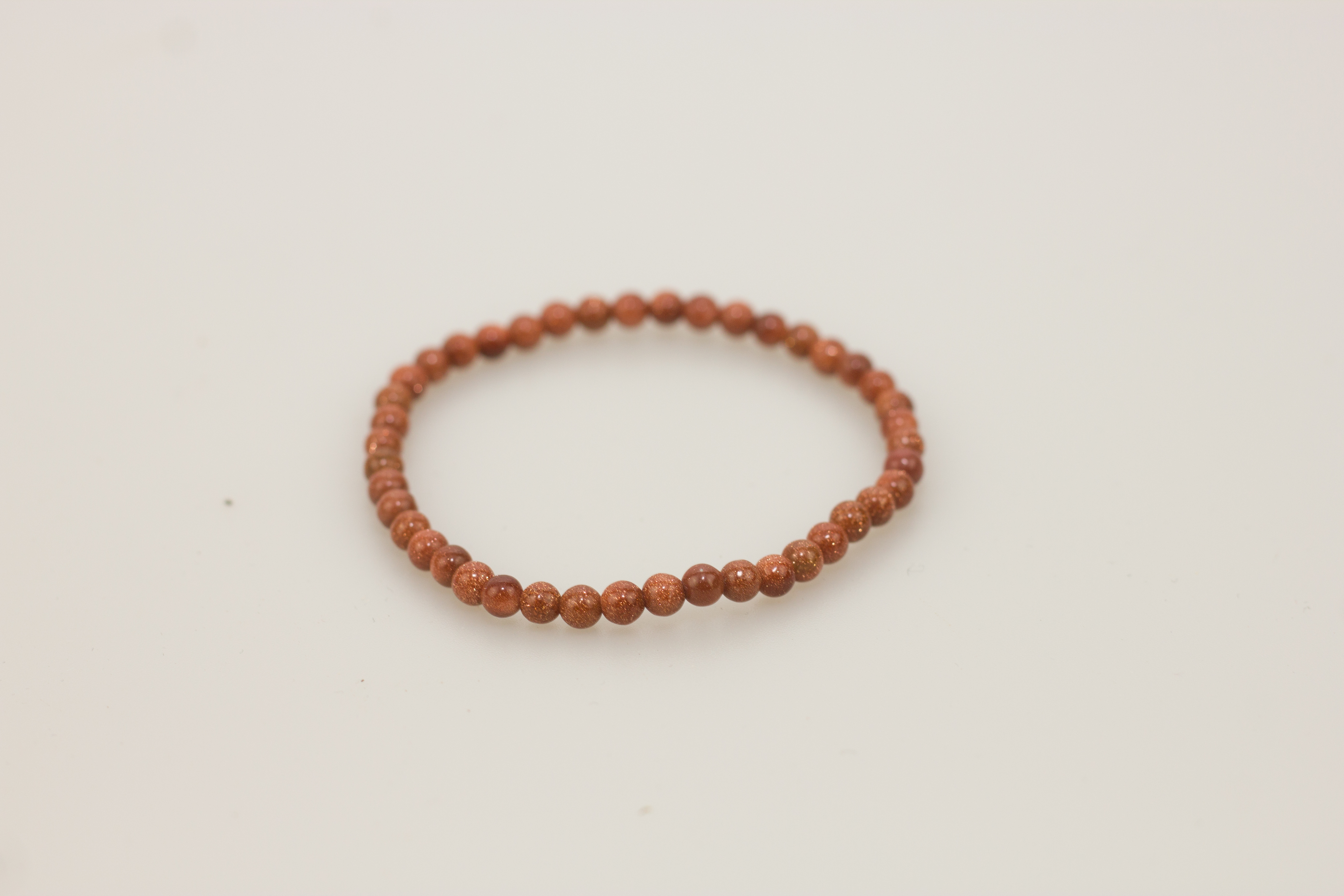 Kugelarmband 4 mm - Goldfluss (synth.) Kugelarmband 4 mm - Goldfluss (synth.)
